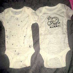 Two onesie size new born never used